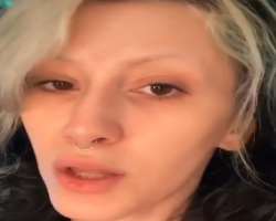 She has a piercing in her nose septum.